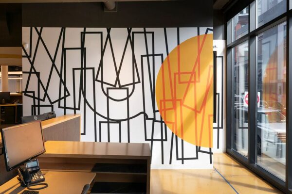 Principal Mimi Love & Artist Cyrille Conan Reflect on art_works Collaboration of a New Mural in Utile’s Boston Office